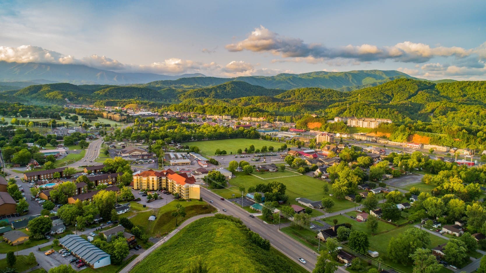 Aerial view of green spaces and real estate in Sevierville, Tennessee